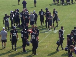 Players take the field at practice