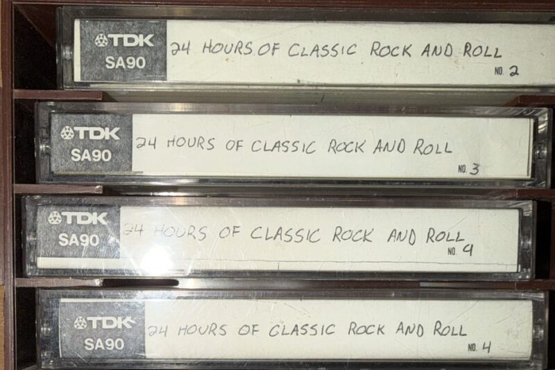 A rack of TDK SA90 cassettes hand-labeled 24 Hours of Classic Rock and Roll